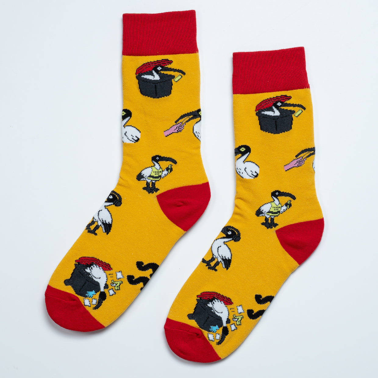 Pair of yellow Bin Chicken Sox featuring Australian ibis, wheelie bins and a do not feed sign
