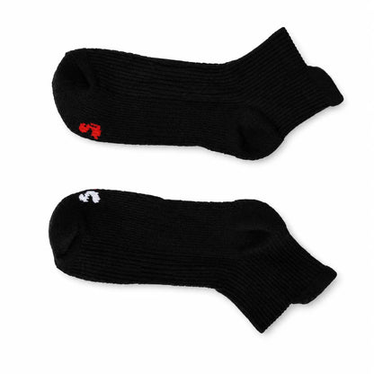 Pair of black ankle compression socks laid flat with coloured toe size markers
