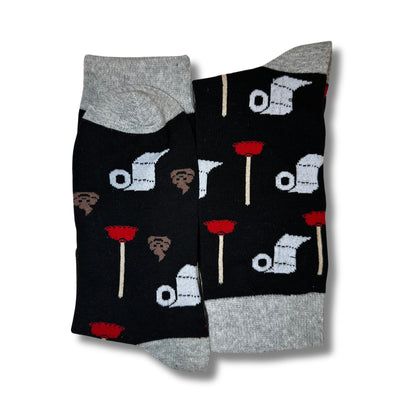 Black novelty toilet socks folded together with grey cuffs, heels and toes
