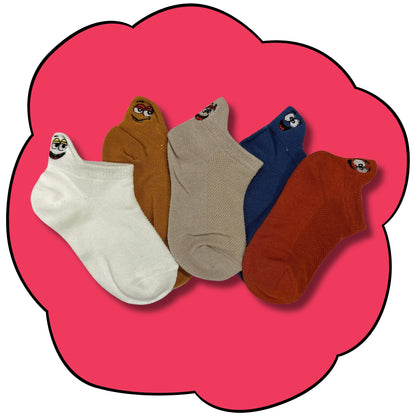 Five colourful kids ankle socks displayed upright with different embroidered character faces