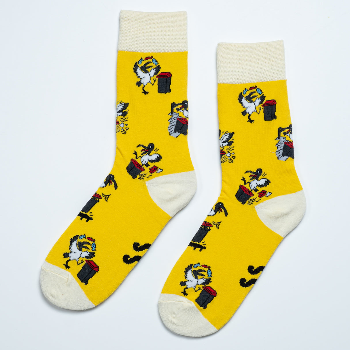Pair of yellow Bin Chicken Sox featuring Australian ibis, wheelie bins and a do not feed sign