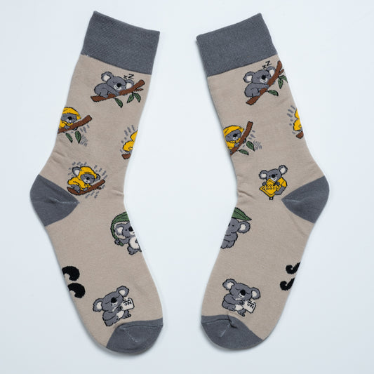 Pair of beige koala crew socks with grey cuffs, heels and toes arranged heel to heel