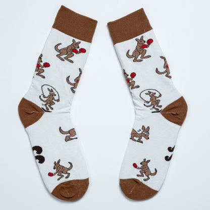 White kangaroo crew socks laid diagonally with brown cuffs, heels and toes