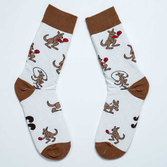 White kangaroo crew socks laid diagonally with brown cuffs, heels and toes