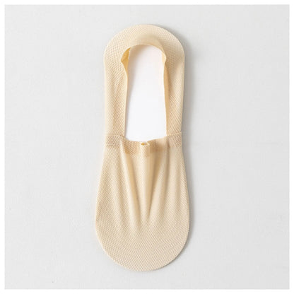 Single nude invisible sock laid flat to show its low-cut shape and breathable mesh fabric