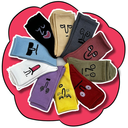 Ten mood face socks arranged in a circular fan in bright and neutral colours