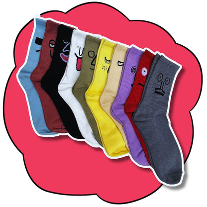 Ten colourful crew socks lined up to show their full length and expressive face designs