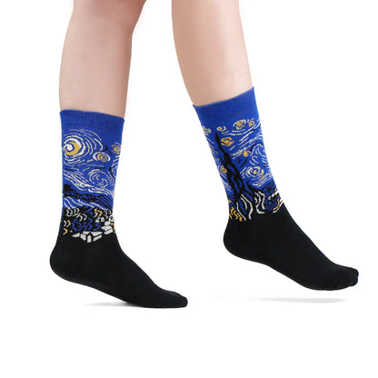 Starry Night art socks worn with both feet raised against a white background