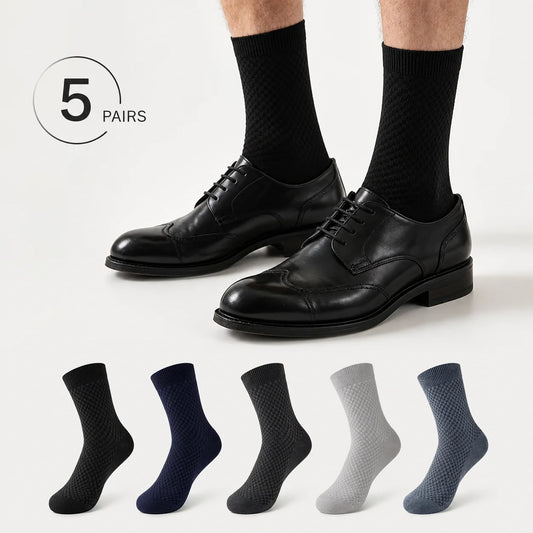 Man wearing black bamboo crew socks with five included colours displayed below