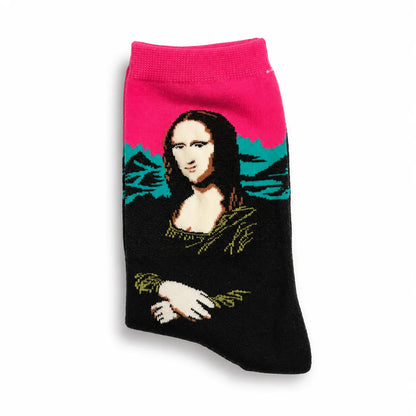 Folded Mona Lisa art sock with a pink cuff showing a close-up of the knitted portrait