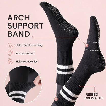 Black Studio Crew Grip Socks highlighting the arch support band and ribbed crew cuff